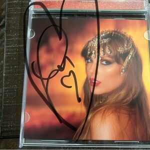 Signed Taylor Swift CD with heart